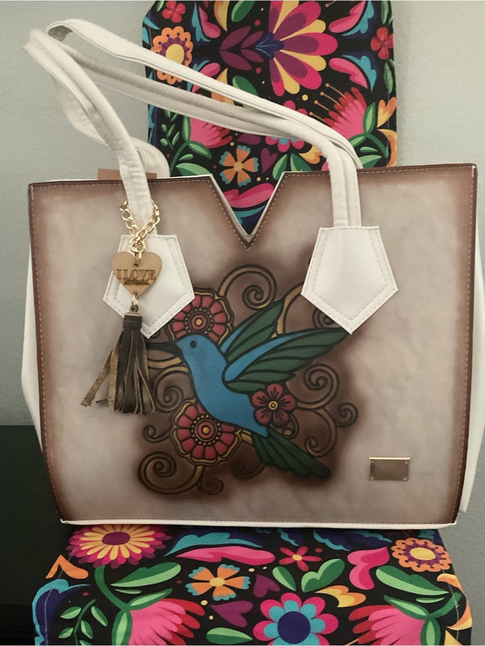 White Tote Bag with Blue Bird Motif and Tassel Charm